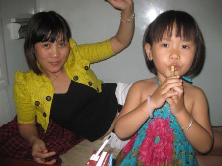 Man and Minh Chau in train compartments