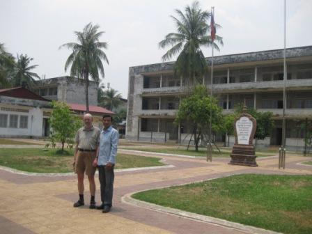 Erik and Sambatch the courtyard at Toul Sleng